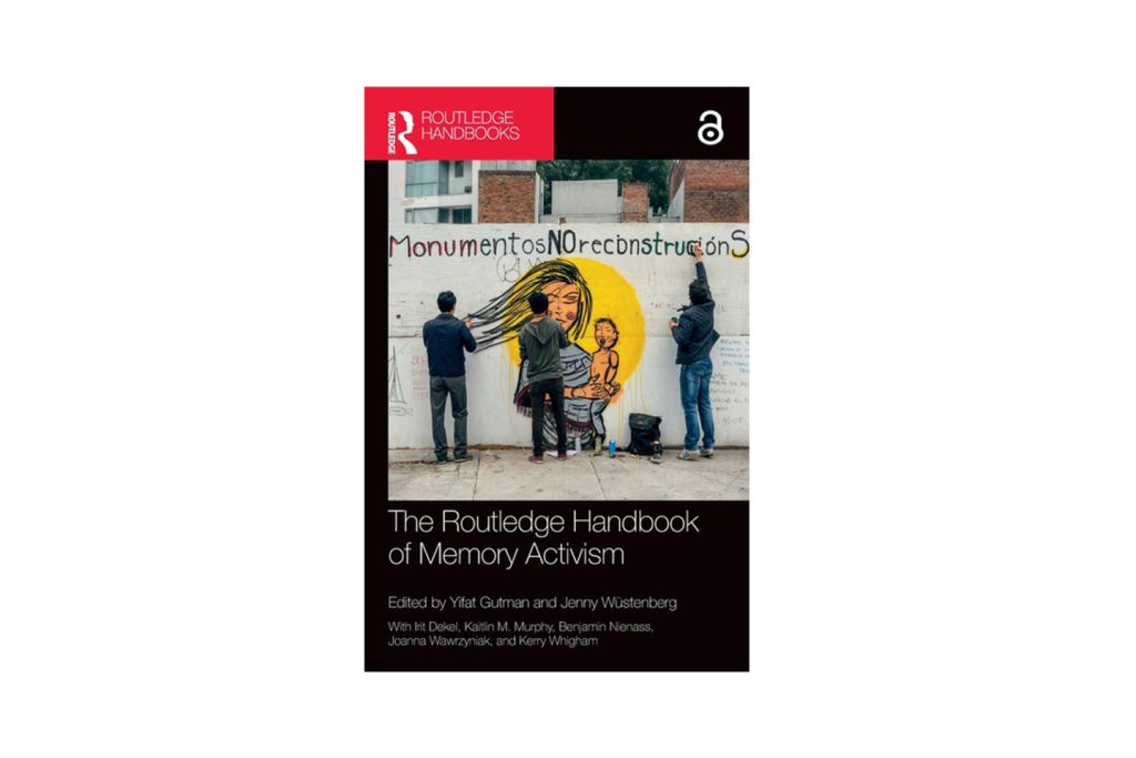 Cover of The Routledge Handbook of Memory Activism showing three people painting a slogan in Spanish above a painting of a mother and child